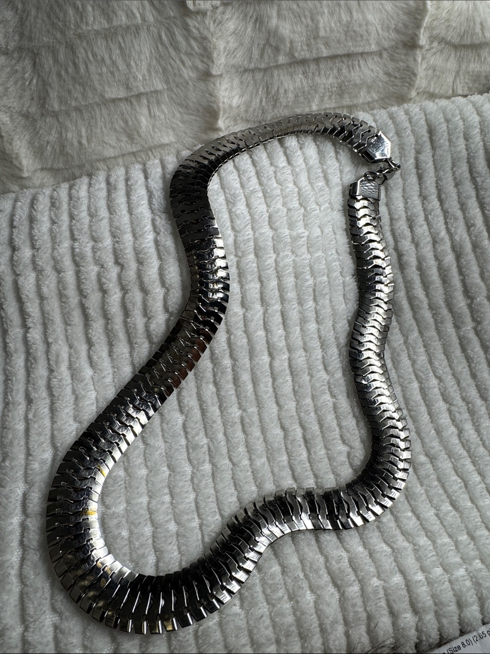 Necklace stainless 24 inches X 1 inch. Fish scale design. Light weight. Shiny!